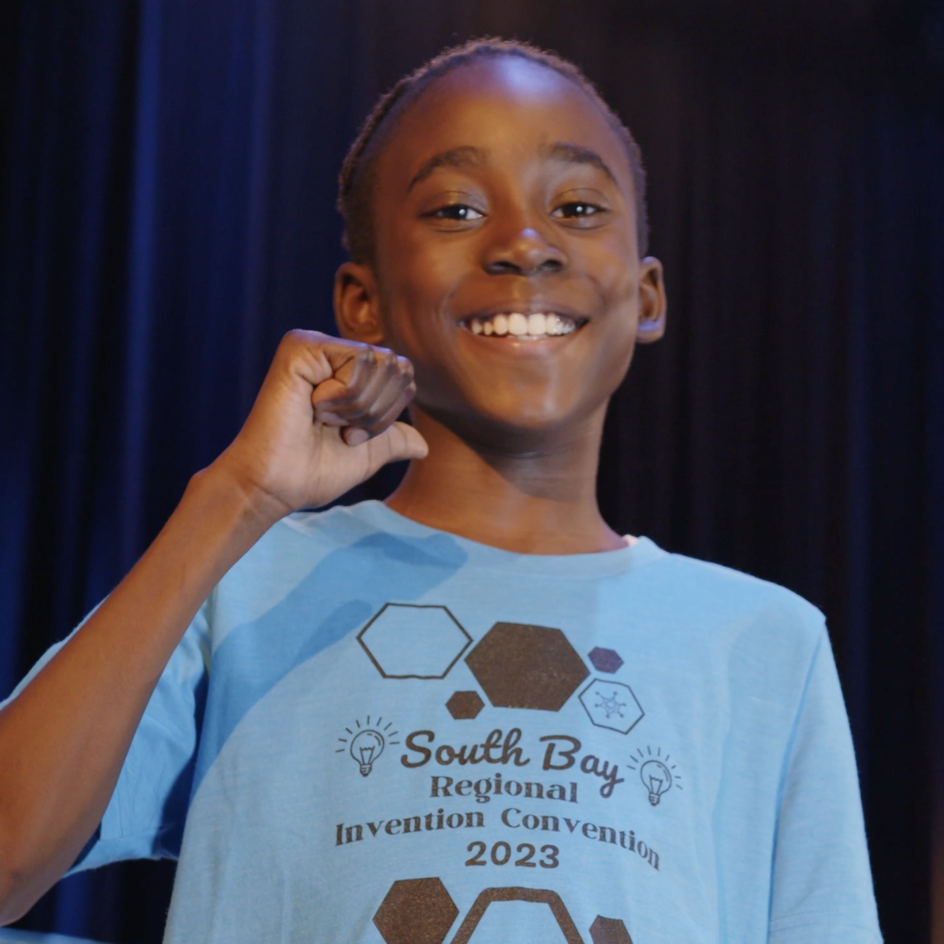 Elementary Student Giving Thumbs Up